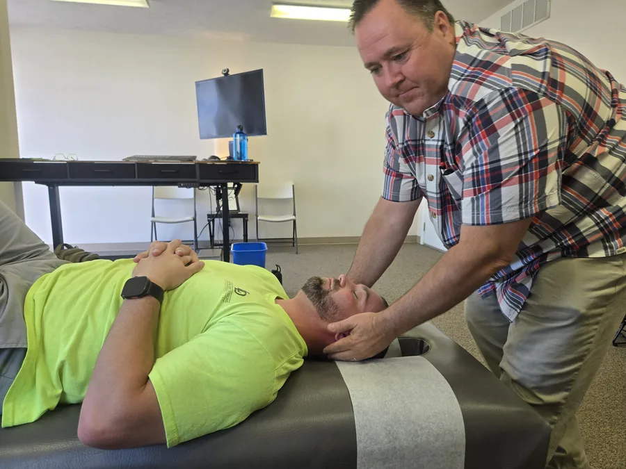Lower-body adjustment for a worker in a hi-vis safety shirt