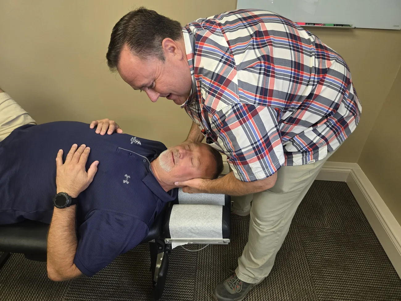 Cervical adjustment on the treatment table