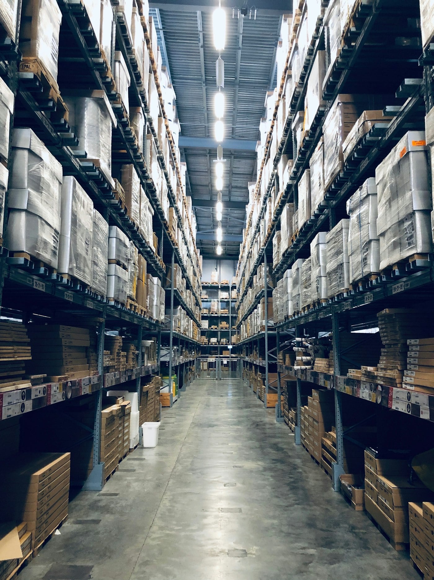 Warehouse and logistics worker moving inventory